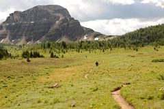 15 Trekking Through Meadow Towards Citadel Peak On Hike To Mount Assiniboine.jpg